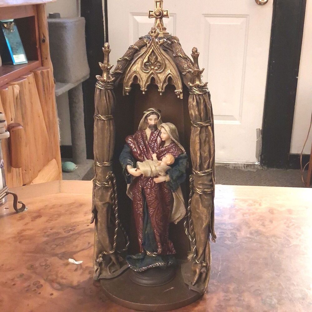 vintage holy family nativity statue in gothic arch grotto cross christmas decor